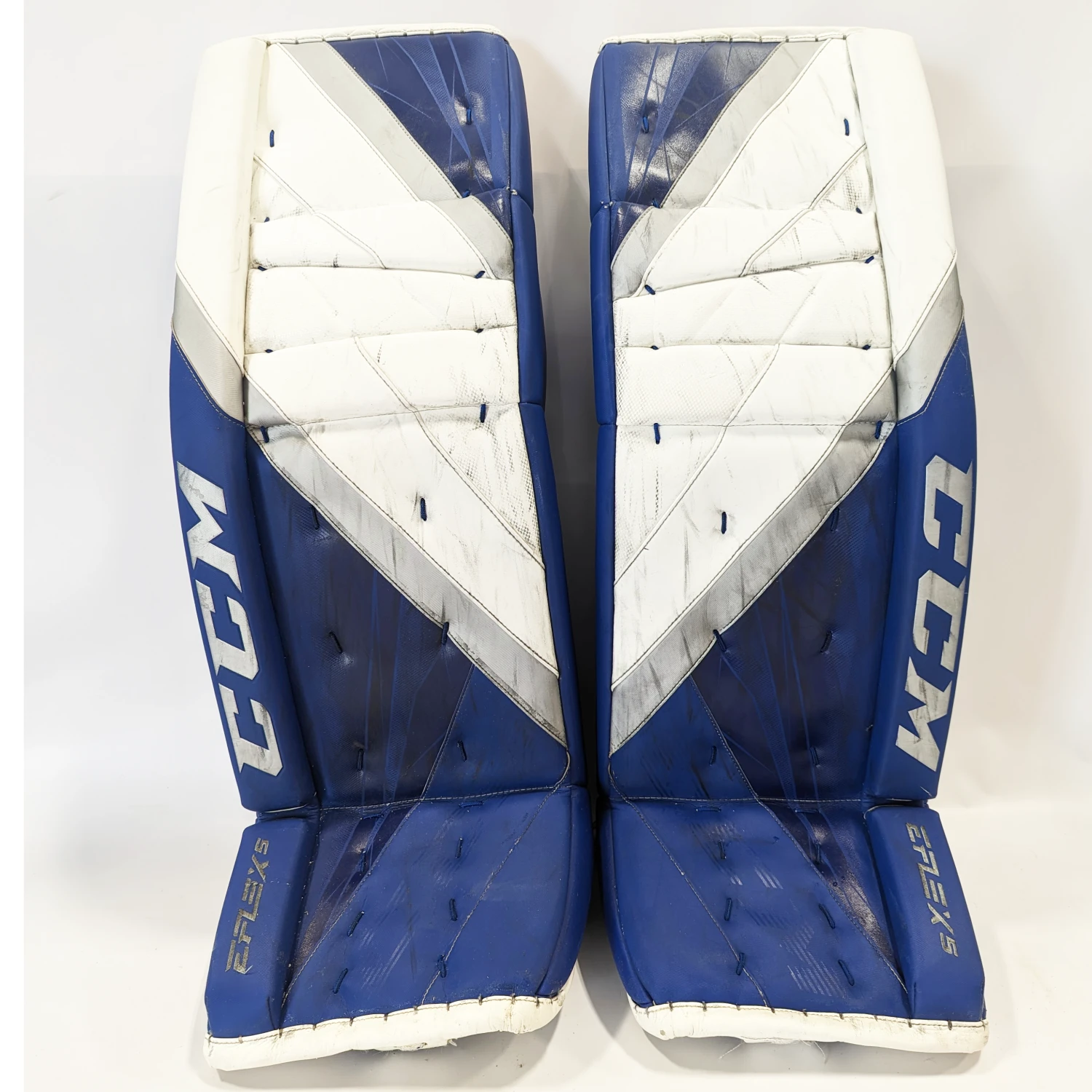 CCM Extreme Flex 5 - Used NCAA Pro Stock Goalie Pads (White/Blue) 1 CCM Extreme Flex 5 - Used NCAA Pro Stock Goalie Pads (White/Blue)
