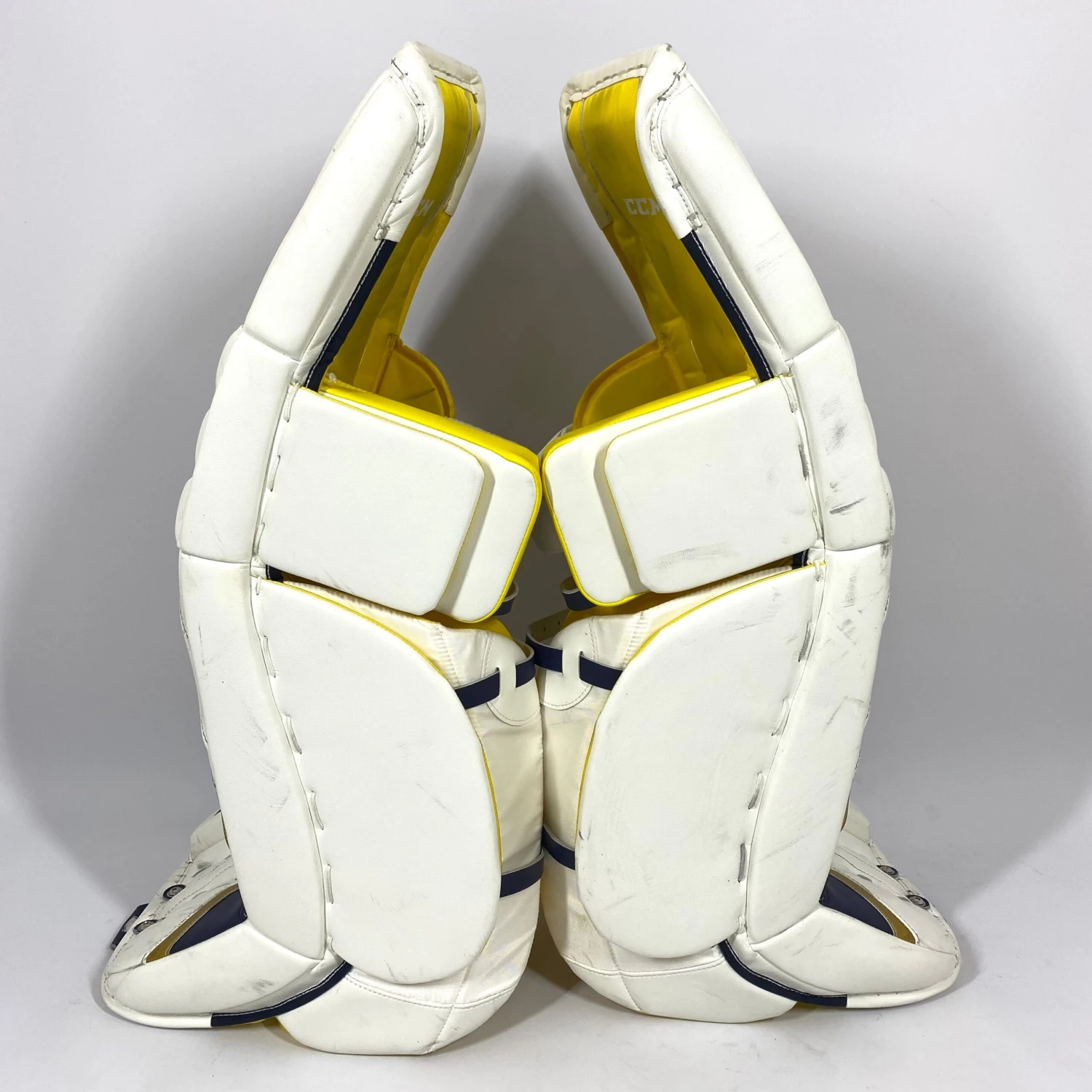 CCM Extreme Flex 4 - Used NCAA Pro Stock Senior Goalie Pads (White/Gold) 2 CCM Extreme Flex 4 - Used NCAA Pro Stock Senior Goalie Pads (White/Gold) - Image 2