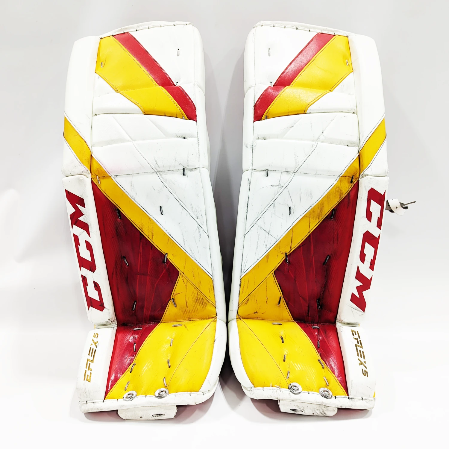 CCM Extreme Flex 5 - Used AHL Pro Stock Goalie Pads (White/Red/Yellow) 2 CCM Extreme Flex 5 - Used AHL Pro Stock Goalie Pads (White/Red/Yellow) - Image 2